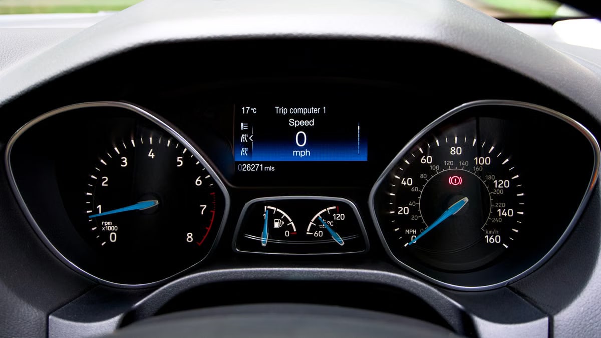Close-up view of a Ford Focus dashboard showing the speedometer and various gauges.